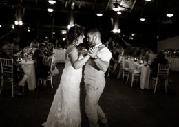 newly married couple dance at wedding reception