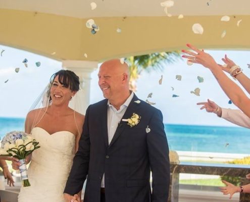 smiling bride and groom after wedding ceremony