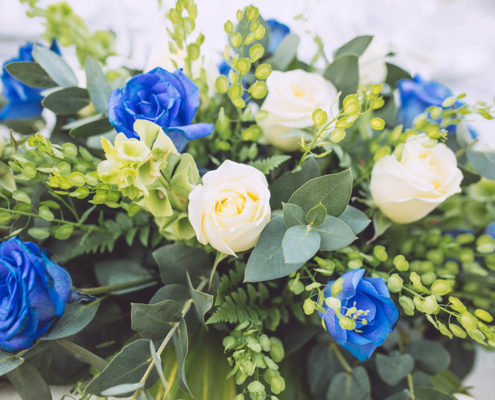 wedding bouquet with blue and white flowers