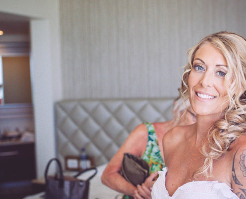 happy bride relaxed and excited for destinationw wedding to start