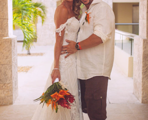 bride and groom smile after wedding