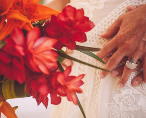 bouquet and bride's hands close up