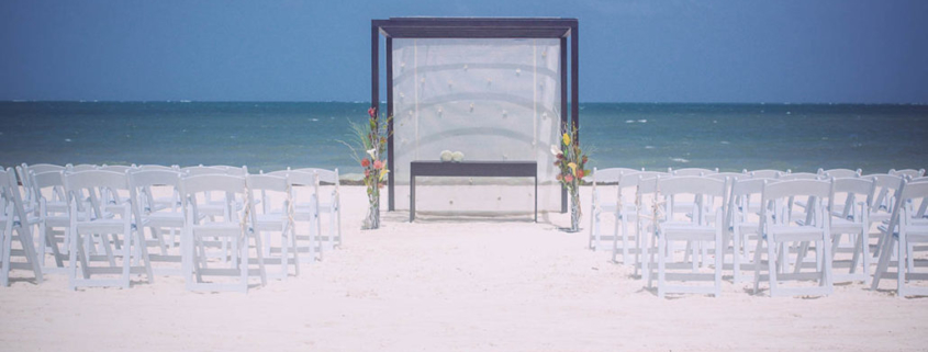 destination wedding planner beach ceremony setup